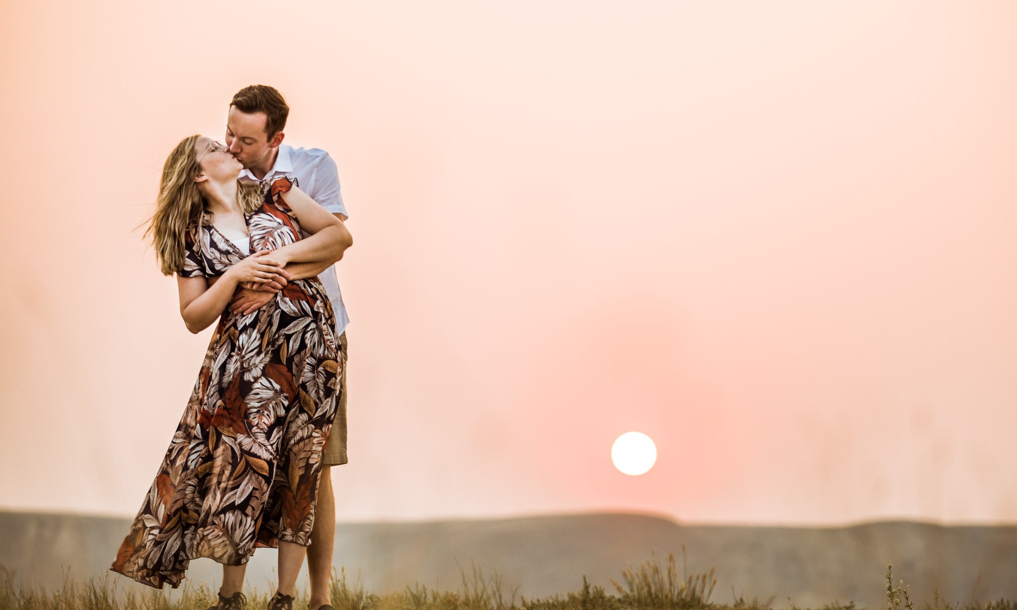 Calgary wedding photographer, engagement session on the beach, couple at sunset at Little Bow Provincial Park