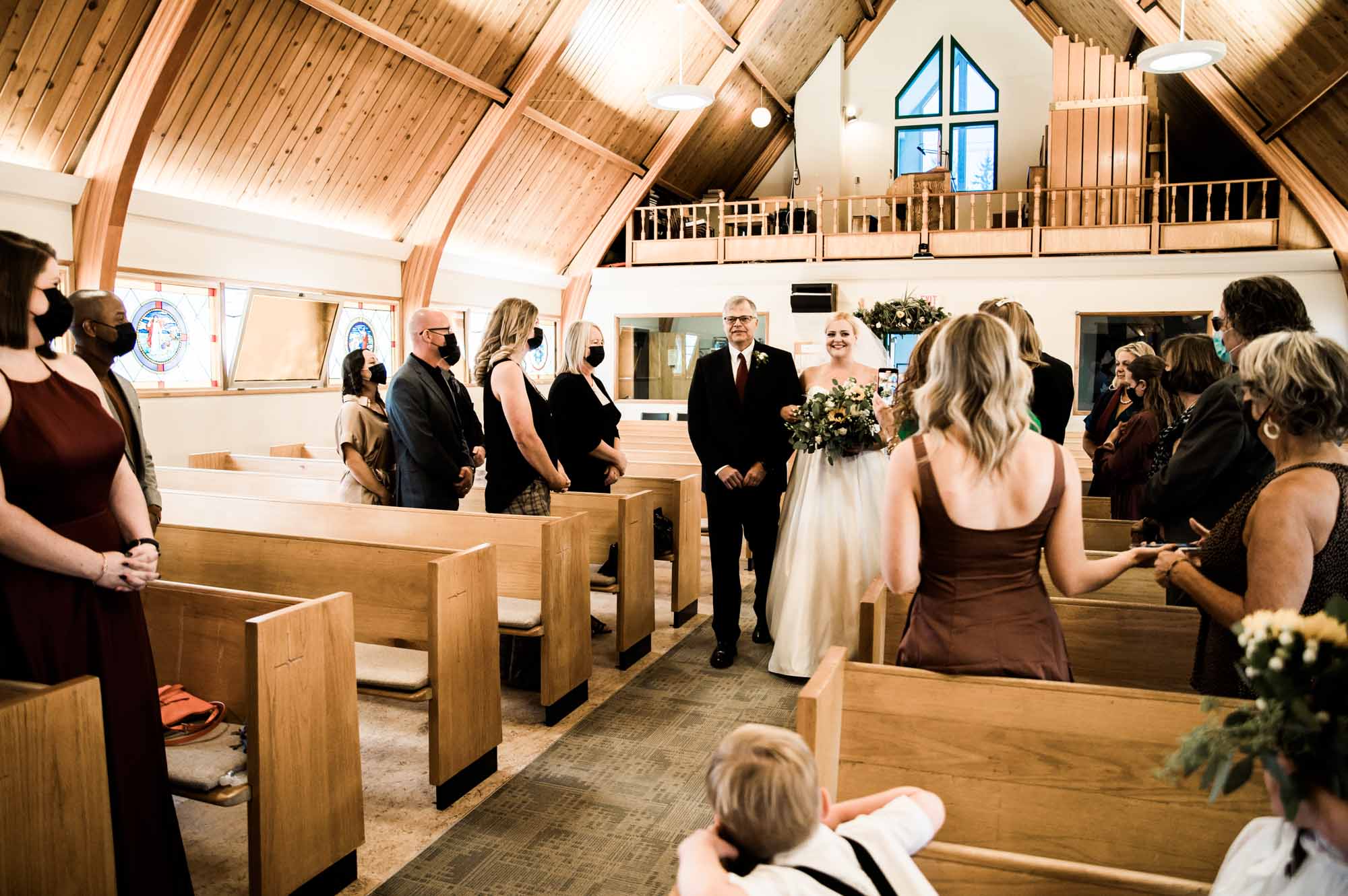 Calgary wedding photographer, bride and groom on their wedding day at a church in Calgary
