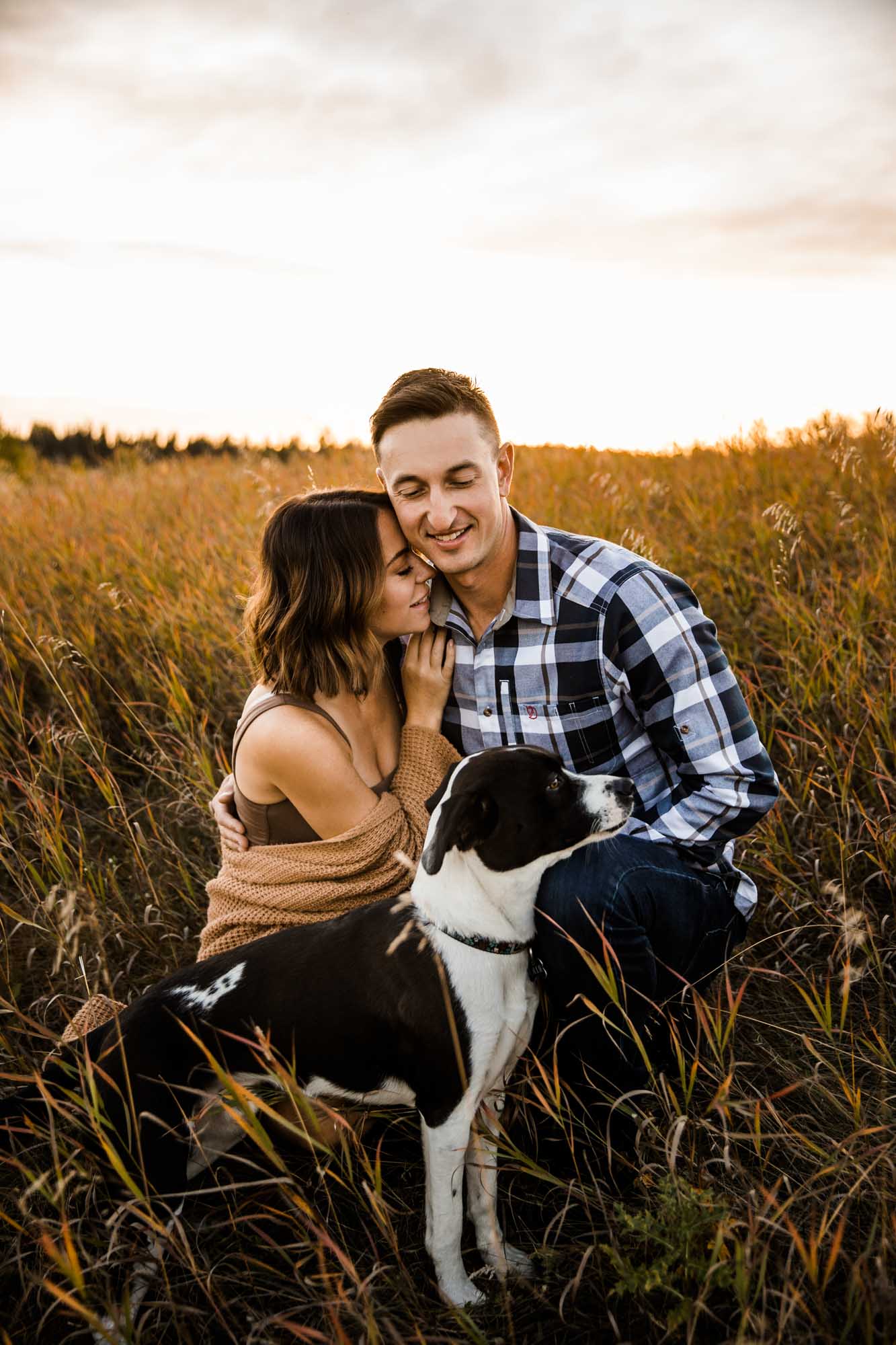 Calgary, Banff, Kananaskis wedding photographer, couple during their engagement photos at Fish Creek Park in Calgary at sunset in the fall